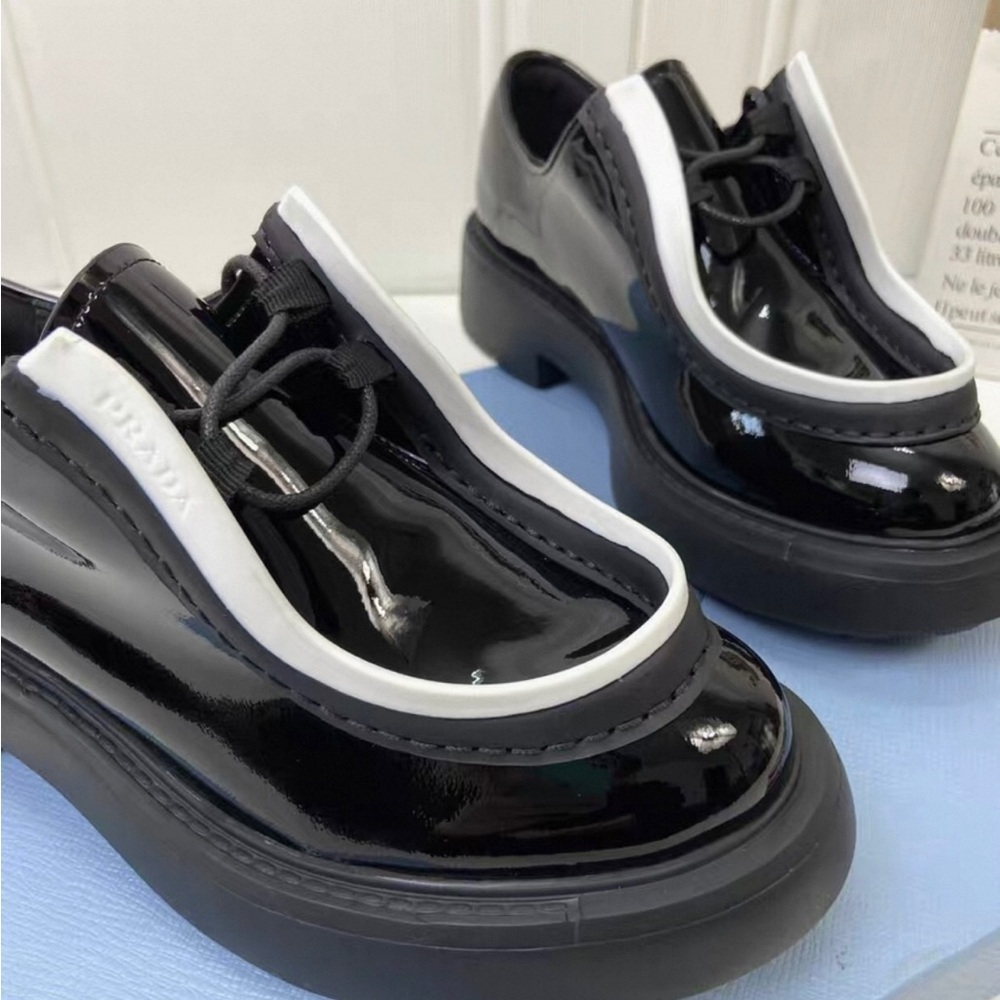 Prada Glossy Black and White Loafers - Picture 2 of 6